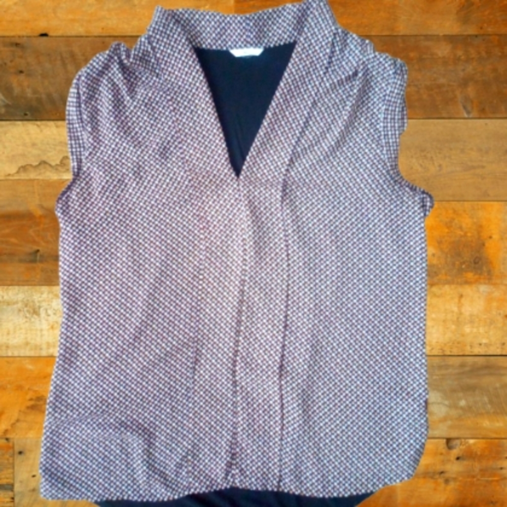 Milano blouse size LG black back w/mini polka dots front*